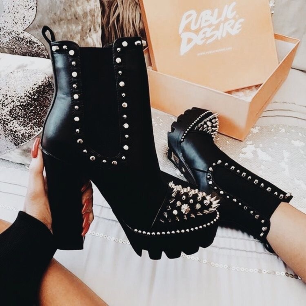 Edgy black studded heel boots